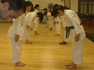 Students bowing
